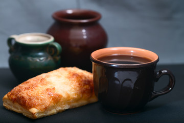 Dark ceramic ware and pie