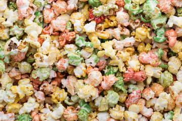 Colored Popcorn texture background. Sweet popcorn.