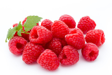 Ripe red raspberries isolated on white background.