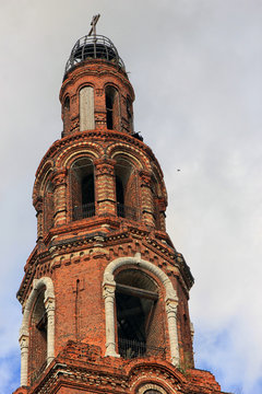 beautiful old russian abandoned bell tower of red brick