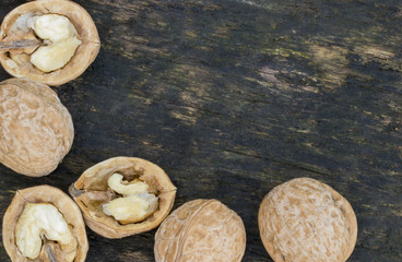 Fototapeta na wymiar Walnuts, walnuts close-up, walnuts on a dark background, walnuts