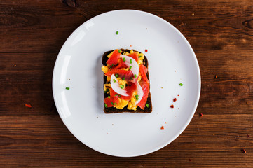 Smorrebrod - danish open sandwich with fish, herring, cheese