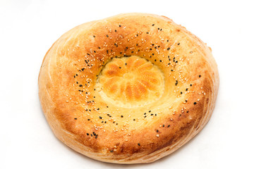 Traditional bread peoples of Central Asia - flat bread, baked in the tandoor oven
