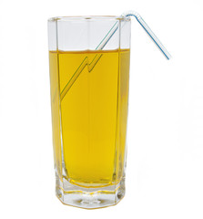 Glass of green apple juice isolated