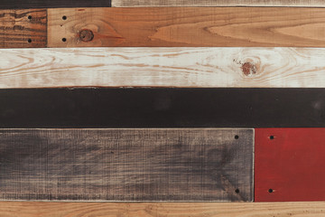 Colorful vintage wooden board texture with nails background
