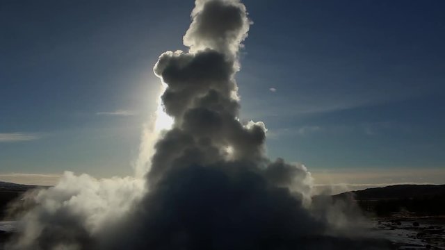 Iceland Geyser Strokkur eruption in winter with spray and steam