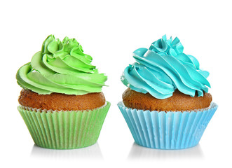 Fresh tasty cupcakes isolated on white