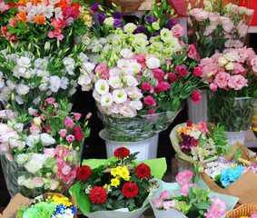 Fototapeta na wymiar Fresh flowers on display outdoors