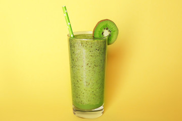 Kiwi smoothie on color background