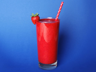 Strawberry smoothie on color background
