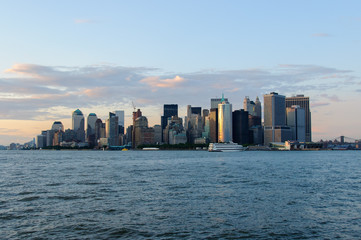 Fototapeta na wymiar Manhattan skyline from bay just before sunset