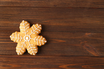 Tasty Christmas tasty cookie on wooden background