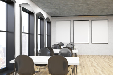 Loft cafe with three vertical posters