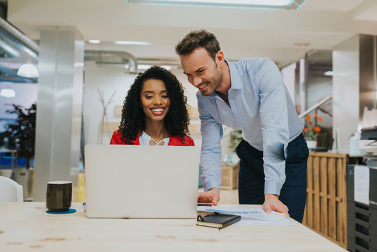 Young business colleagues working in office