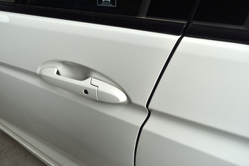 car door handle. white color.