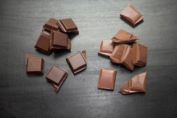 slices of chocolate on a black background