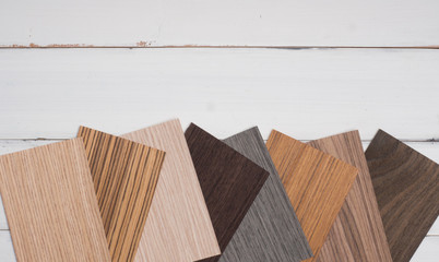 samples of veneer wood  on  white wood  background