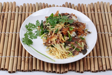 Thai food, Fried ginger with Tilapia fish  (Call Pla Nil Pad Khing in Thai) 