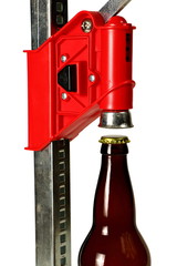 Bottle Cap Press with Bottle for Homebrew Beer, Close Up