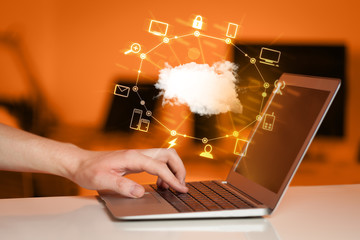 Hand working with a Cloud Computing diagram