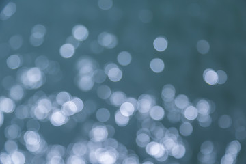 Blue sea water bokeh background