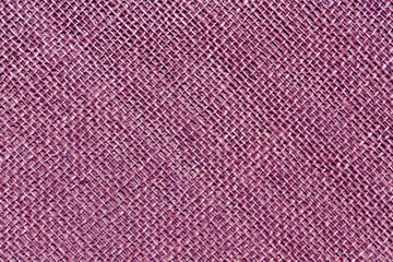 Magenta toned hessian sack cloth texture.
