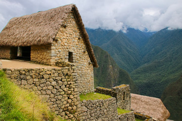 Fototapeta na wymiar Stone building at Machu Picchu citadel in Peru