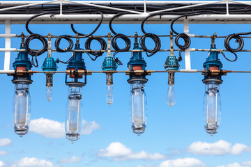 イカ釣り漁船の集魚灯と青空