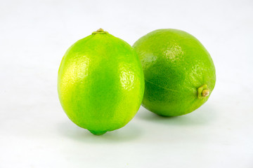 Lime fruit on a white background.