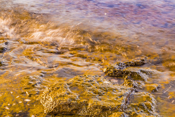rock emerging from water
