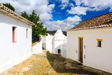 Typical street in the lovely village of Mertola. Alentejo Region. Portugal