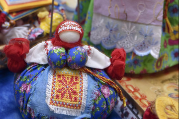 Fototapeta premium Traditional soft toys of colored fabric handmade