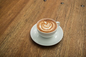 coffee on wood background.