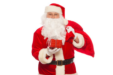 Santa Claus: Cheerful With Small Stack Of Gifts big bag, isolated on white background Christmas.
