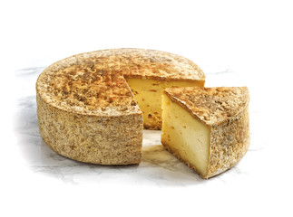 Artisan cheese on a marble surface