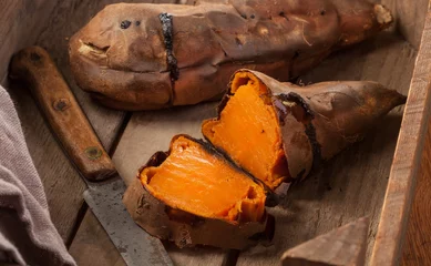 Foto op Canvas Oven baked sweet potatoes © hansgeel