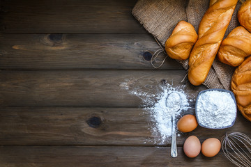 baking background with raw eggs, sugar and flour