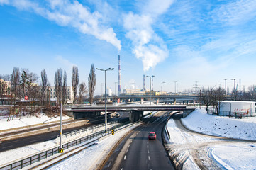 Industrial pollution, winter landscape with snow