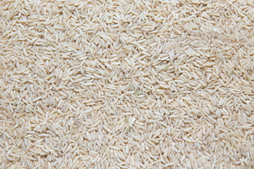 Uncooked Brown rice closeup , background.
