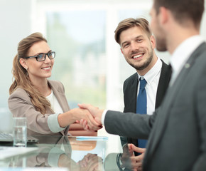 Business woman shaking hand to  her  partner