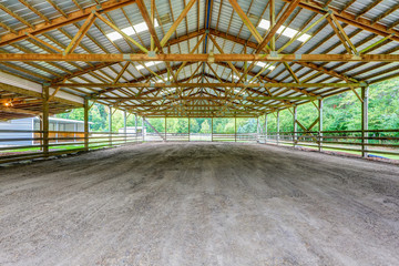 Empty paddock with shelter in the horse farm