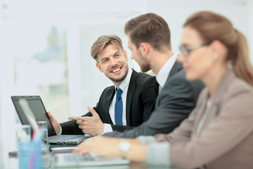 Fototapeta premium Business people working on laptop in an office