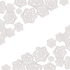 Decorative snowflakes crocheted from white threads. Isolated 