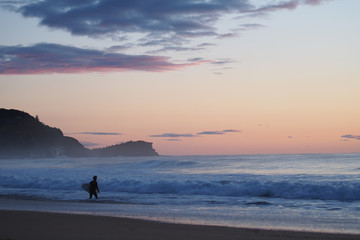 Fototapeta na wymiar surfer alone