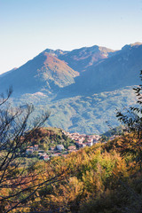 characteristic italian old town view with mountains 02