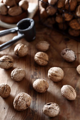 walnut on a wood background with nutcracker 