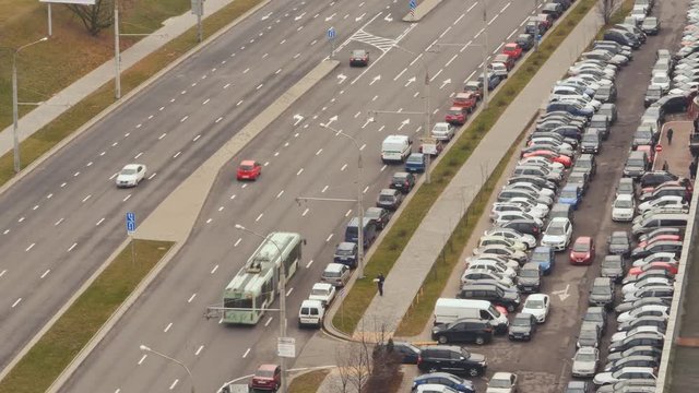 Road with car traffic. Car parking. Timelapse.