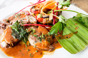 Fresh chicken steak with tomatoes