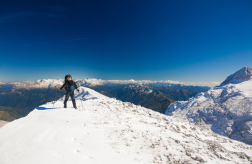 Fototapeta na wymiar A woman in mountain day winter
