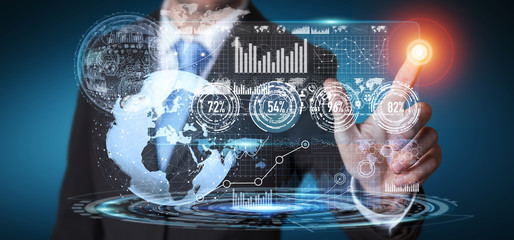 Businessman using hologram screen with digital data